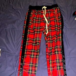KDNK plaid joggers with zipper pockets and zippers in the bottom